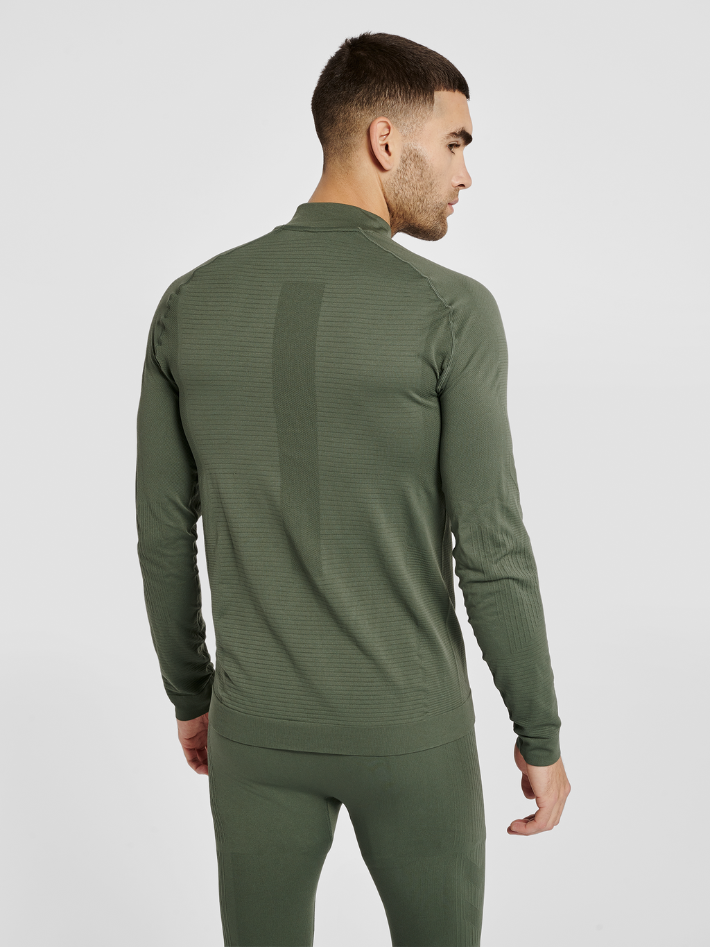 hmlSTROKE SEAMLESS HALF ZIP
