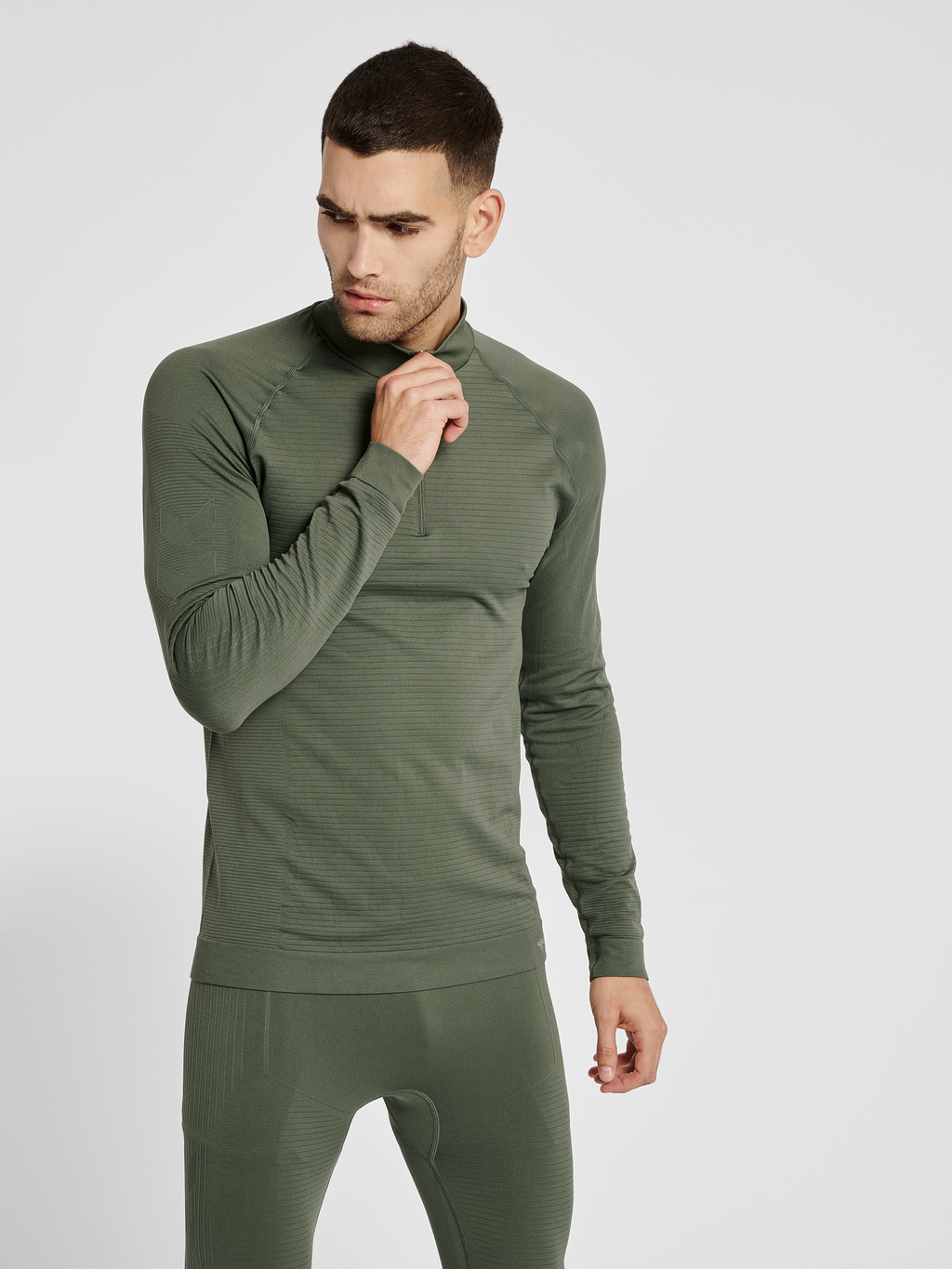 hmlSTROKE SEAMLESS HALF ZIP